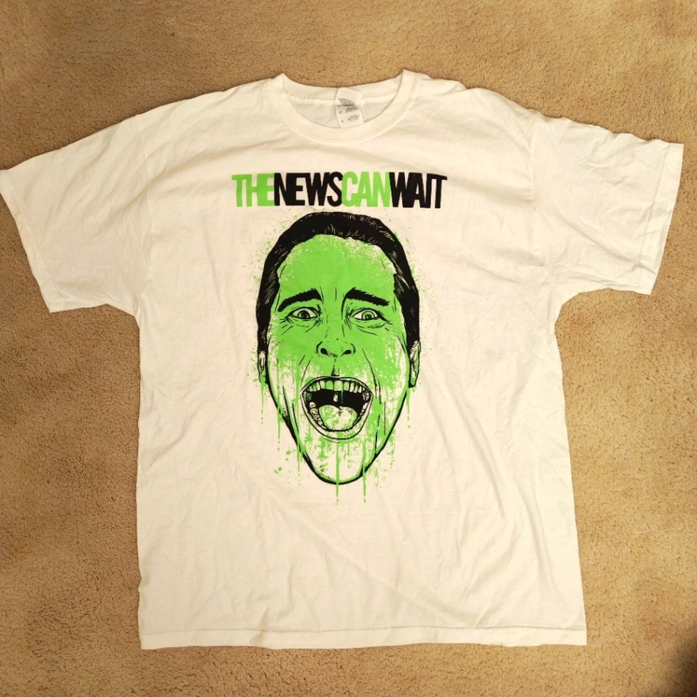 Y2K American Psycho Melting Face The News Can Wait Graphic T-shirt.